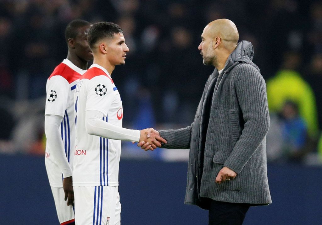 Soccer Football - Champions League - Group Stage - Group F - Olympique Lyonnais v Manchester City - Groupama Stadium, Lyon, France - November 27, 2018  Manchester City manager Pep Guardiola shakes the hand of Lyon's Houssem Aouar after the match            REUTERS/Emmanuel Foudrot