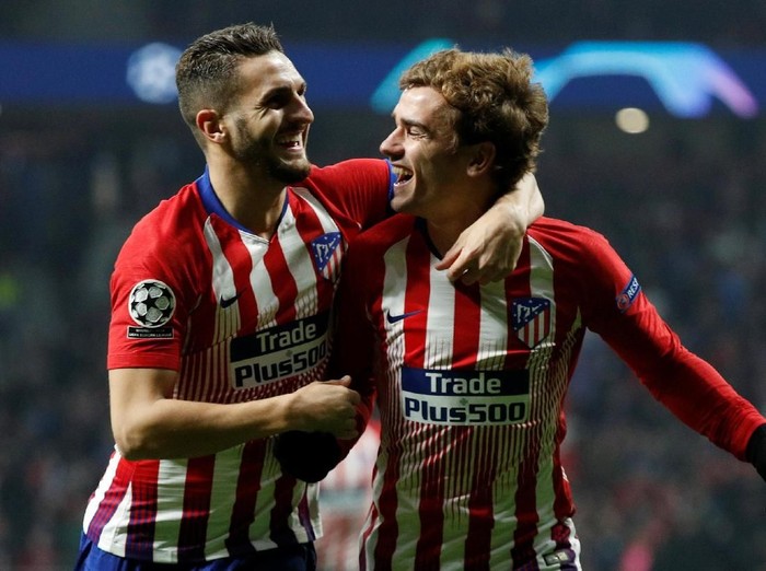 Soccer Football - Champions League - Group Stage - Group A - Atletico Madrid v AS Monaco - Wanda Metropolitano, Madrid, Spain - November 28, 2018  Atletico Madrids Koke celebrates scoring their first goal with Antoine Griezmann   REUTERS/Paul Hanna