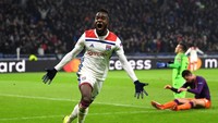 Maxwel Cornet tampil trengginas ketika Lyon berimbang 2-2 kontra Manchester City. Cornet bikin dua gol yang membuat City dua kali tertinggal. Dia diganjar nilai 9,5 atas penampilannya. (Foto: Shaun Botterill/Getty Images)