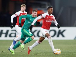 Arsenal tercatat menguasai bola dengan persentase 57%, melepaskan 13 percobaan di mana sembilan di antaranya tepat target. REUTERS/Valentyn Ogirenko.
