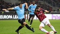 Bertanding di San Siro, Jumat (30/11/2018) dini hari WIB, Milan unggul lebih dulu lewat aksi Patrick Cutrone di menit ke-20. Sepakannya di mulut gawang gagal dihentikan kiper Dudelange. (Foto: Marco Luzzani/Getty Images)
