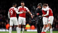 Arsenal pun pantas berpesta. Mereka sudah 19 pertandingan tak menelan kekalahan dalam 19 pertandingan di semua ajang. (Foto: David Klein/Reuters)