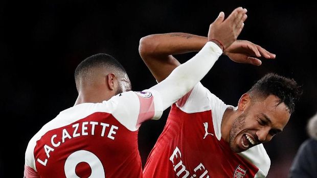 Pierre Emerick Aubameyang dam Alexandre Lacazette jadi sosok yang patut diwaspadai oleh lini belakang Liverpool.