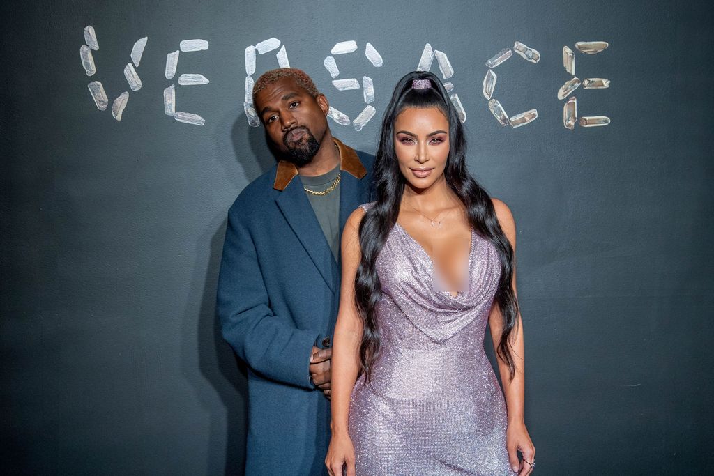 NEW YORK, NEW YORK - DECEMBER 02: Kanye West and Kim Kardashian West attend the the Versace fall 2019 fashion show at the American Stock Exchange Building in lower Manhattan on December 02, 2018 in New York City. (Photo by Roy Rochlin/Getty Images)