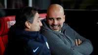 Hasil-hasil itu sudah cukup untuk membuat Josep Guardiola terus tersenyum. (Foto: David Klein/Reuters)