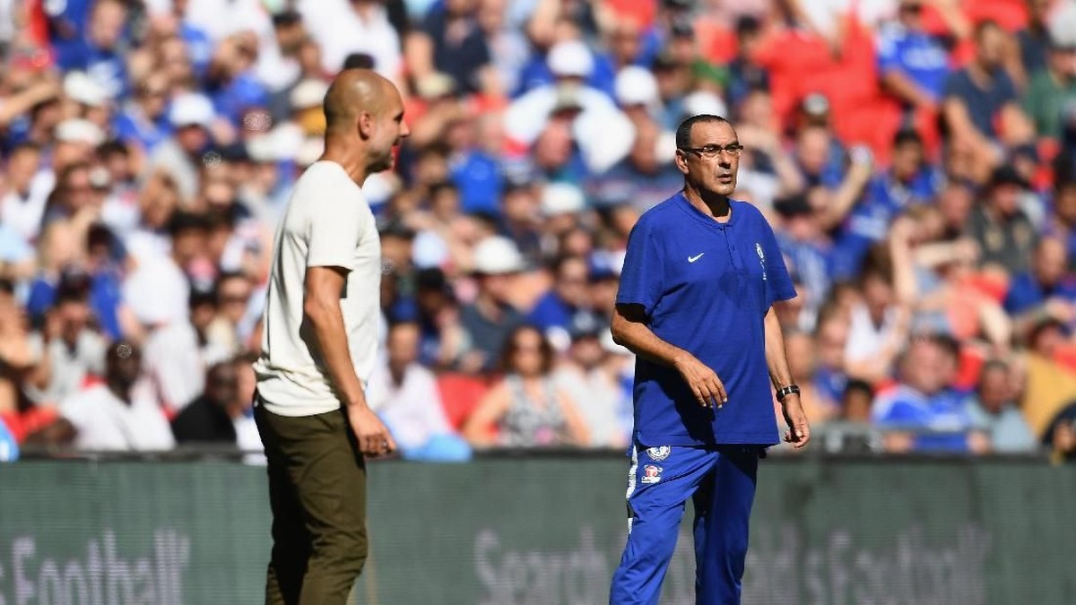Maurizio Sarri dan Pep Guardiola akan berhadapan akhir pekan ini (Clive Mason/Getty Images)