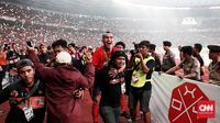 Riko Simanjuntak merayakan keberhasilan Persija Jakarta menjadi juara Liga 1 2018.