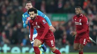 Memastikan lolos ke babak 16 besar, Liverpool cuma menempati urutan ke-14 dalam daftar pencetak gol terbanyak di fase grup. The Reds cuma menyarangkan 9 gol di putaran grup, turun drastis dari musim lalu yang mampu mencetak 23 gol dari 6 laga di fase grup. (Foto: Reuters)