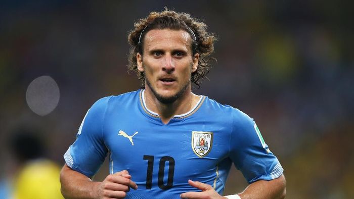 Diego Forlan memutuskan pensiun sebagai pesepakbola (Foto: Clive Rose/Getty Images)