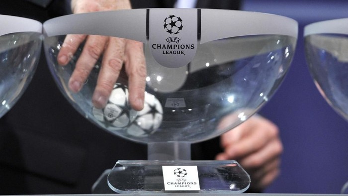 NYON, SWITZERLAND - JUNE 24:  Gianni Infantino, UEFA General Secretary, draws a ball during the UEFA Champions League Q2 qualifying round draw at the UEFA headquarters on June 24, 2013 in Nyon, Switzerland.  (Photo by Harold Cunningham/Getty Images)