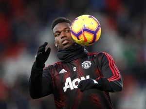 Di Balik Senyum Paul Pogba Usai Mourinho Dipecat