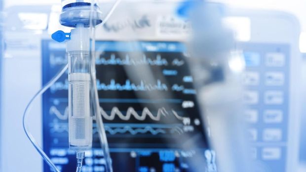 Iv drip on the background of monitoring ECG.