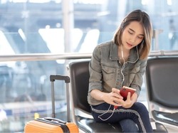 Hiburan yang Bisa Dilakukan Saat Menunggu Boarding Pesawat