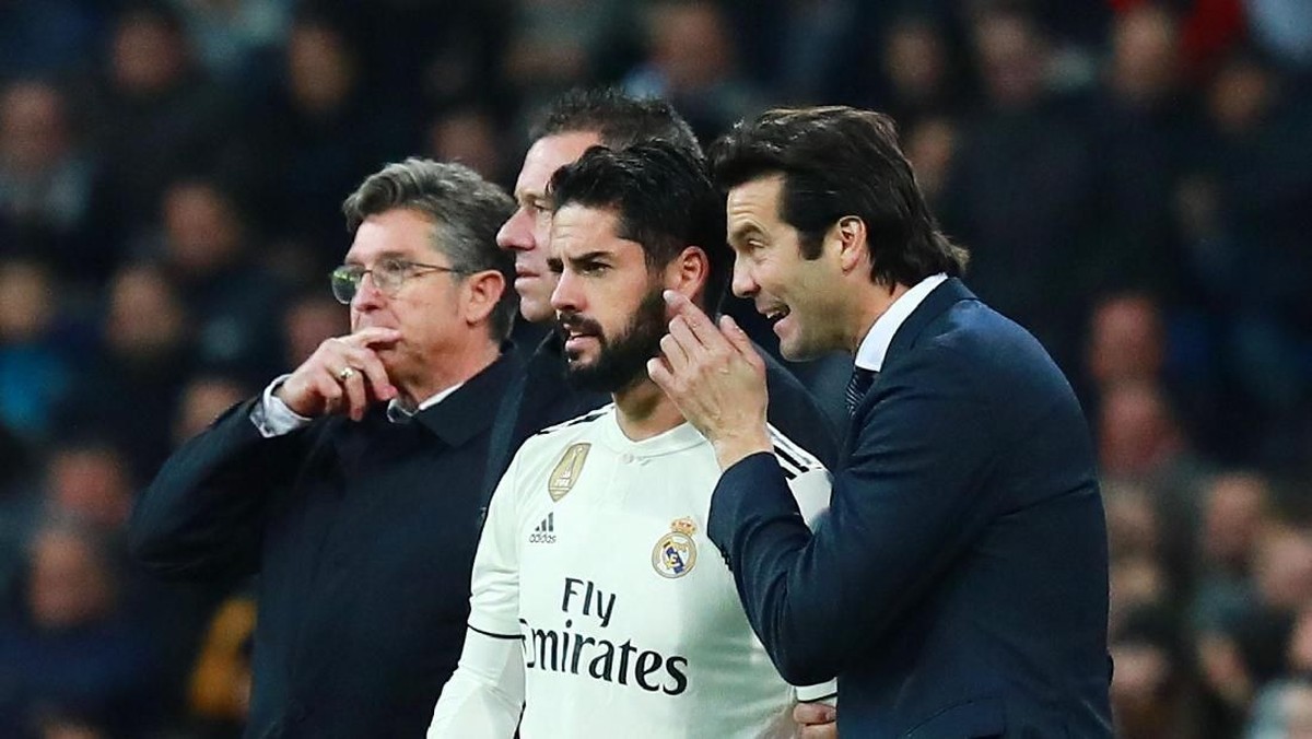 Isco dan pelatih Real Madrid Santiago Solari (kanan). (Foto: Gonzalo Arroyo Moreno/Getty Images)