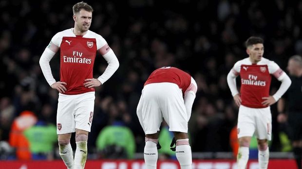 Ramsey (kiri) akan menjadi pemain Juventus pada musim depan.