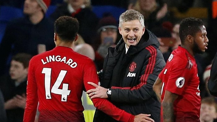 Soccer Football - Premier League - Cardiff City v Manchester United - Cardiff City Stadium, Cardiff, Britain - December 22, 2018  Manchester United interim manager Ole Gunnar Solskjaer celebrates after the match with Jesse Lingard   Action Images via Reuters/Craig Brough  EDITORIAL USE ONLY. No use with unauthorized audio, video, data, fixture lists, club/league logos or 