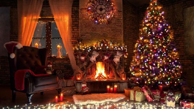 Beautiful living room with fire place decorated for christmas