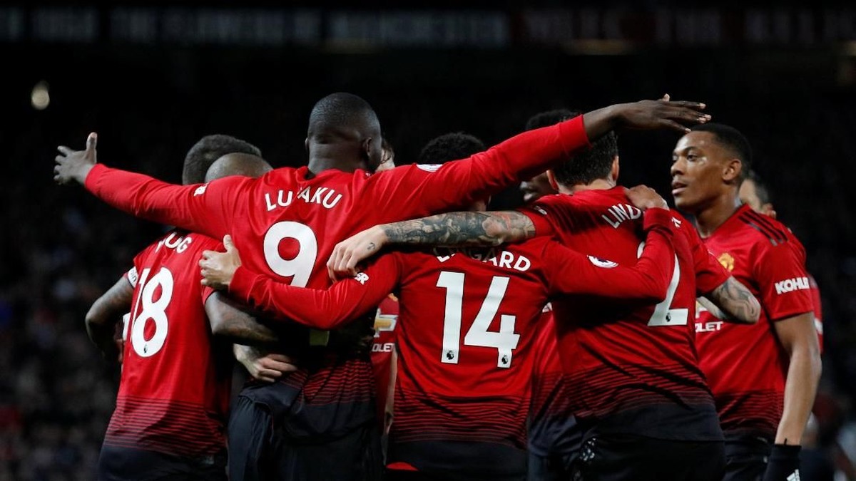 Pemain dan fans Manchester United bisa merayakan tahun baru dengan indah (REUTERS/Phil Noble)