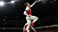 Ramsey membawa perubahan saat masuk menggantikan Lacazette. Peran vitalnya kian terbukti usai menyumbang gol ketiga timnya. (Foto: John Sibley/Reuters)