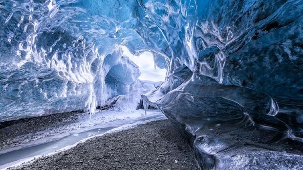 Blue glacier cave in Iceland
