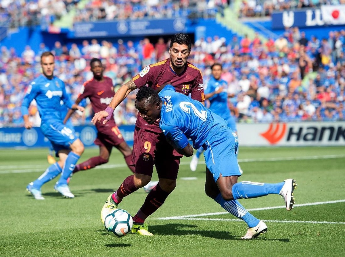 Barcelona sempat disulitkan Getafe pada musim lalu. Foto: Denis Doyle/Getty Images