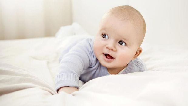 Adorable and happy baby boy.