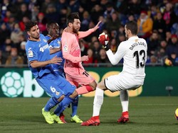 Lionel Messi mencetak gol pertama Barcelona di 2019 saat membobol gawang Getafe pada menit ke-20. Itu adalah peluang pertama Barca di laga itu. (Sergio Perez/Reuters)