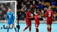 Divock Origi menyamakan skor pada menit ke-51 lewat sepakan terukur dari luar kotak penalti. Ini adalah gol kedua Origi musim ini.(Carl Recine/Reuters)