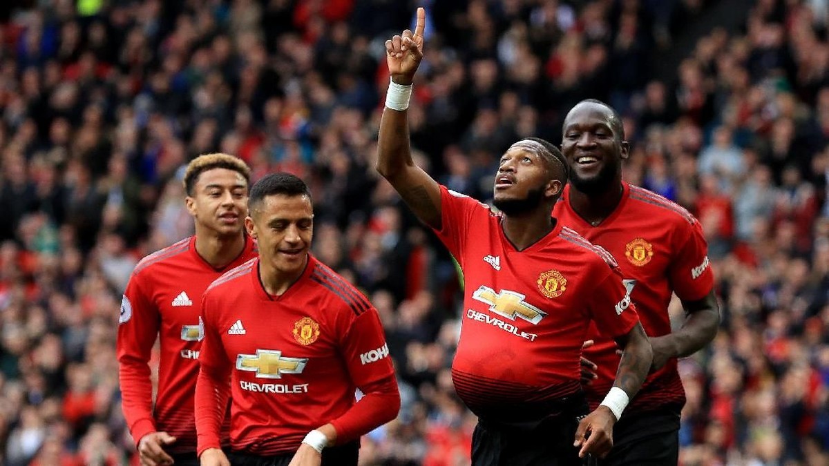 Gelandang Manchester United Fred saat berselebrasi dengan memasukkan bola ke perut tanda bakal dikaruniai momongan. (Foto: Matthew Lewis/Getty Images)