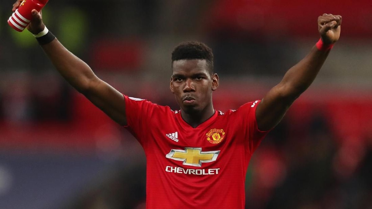 Paul Pogba tidak dikenali penumpang kereta di Manchester. Foto: Catherine Ivill/Getty Images