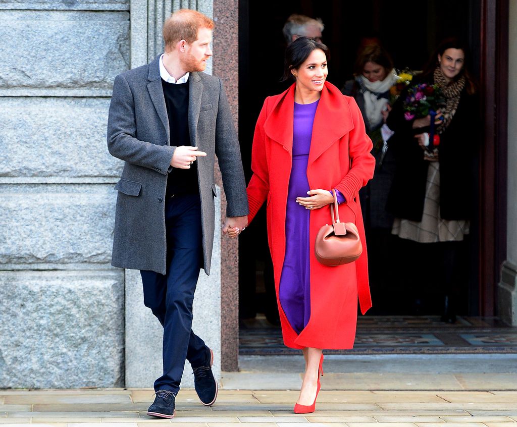 BIRKENHEAD, UNITED KINGDOM - JANUARY 14: Prince Harry, Duke of Sussex and Meghan, Duchess of Sussex visit a new statue to mark the 100th anniversary of the death of poet Wilfred Owen, which was erected on Hamilton Square in November, during an official visit to Birkenhead on January 14, 2019 in Birkenhead, United Kingdom. (Photo by Charlotte Graham - WPA Pool/Getty Images)