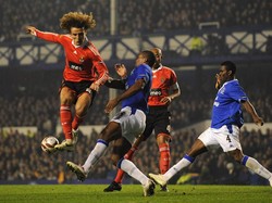 Pada 2009, David Luiz masih membela Benfica. Begini gaya bek asal Brasil itu pada 10 tahun lalu. Kini, David Luiz bermain untuk Chelsea. (Foto: Laurence Griffiths/Getty Images)