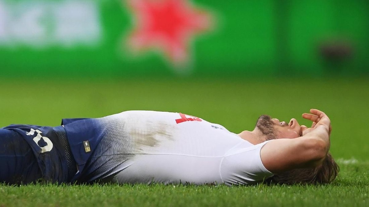 Harry Kane akan absen sampai Maret karena cedera pergelangan kaki. Foto: Mike Hewitt/Getty Images