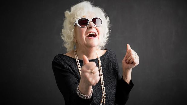 Cool grandma with both of her thumbs up