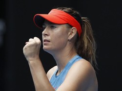 Sharapova Singkirkan Wozniacki
