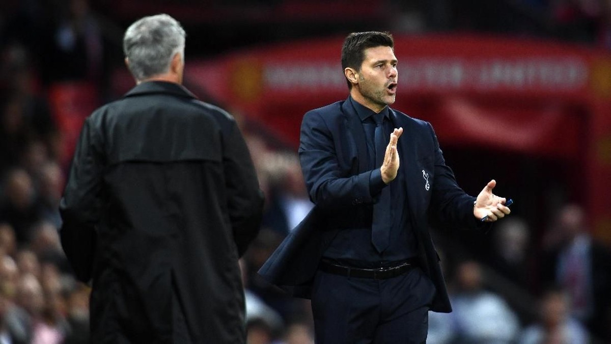 Wayne Rooney menyarankan Manchester United agar mengejar Mauricio Pochettino (Foto: Clive Mason/Getty Images)
