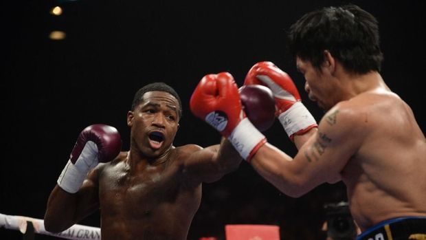 Broner kerap ditekan Pacquiao di sepanjang pertandingan.