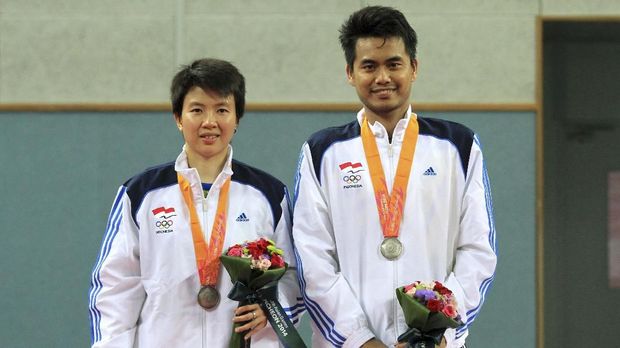 Tontowi Ahmad (kanan) punya banyak cerita saat berduet dengan Liliyana Natsir.