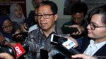 Senyum Plt Ketum PSSI Joko Driyono Saat Diperiksa Polisi