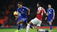 Tak ingin menyerah, Cardiff memangkas ketertinggalan di menit ke-93 ketika Mendez-Laing berhasil merobek gawang Arsenal. Namun, poin itu tak merubah keadaan, Cardiff harus tunduk dari Arsenal dengan skor akhir 2-1 kemenangan untuk The Gunner. Peter Cziborra/Reuters.