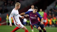 Trio Phlippe Coutinho, Lionel Messi, dan Luis Suarez dipasang di lini serang. REUTERS/Albert Gea.