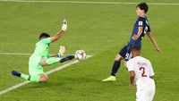 Jepang membuka asa di babak kedua ketika Takumi Minamino pada menit ke-69 membobol gawang Qatar. Ini jadi gol pertama yang bersarang di jala mereka selama turnamen. (REUTERS)