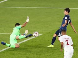 Jepang membuka asa di babak kedua ketika Takumi Minamino pada menit ke-69 membobol gawang Qatar. Ini jadi gol pertama yang bersarang di jala mereka selama turnamen. (REUTERS)