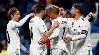 Kemenangan ini membuat El Real kini mengumpulkan 44 angka dan menempati peringkat ketiga. Los Blancos hanya tertinggal dua angka dari Atletico di urutan kedua serta delapan angka dari Barcelona yang memuncaki klasemen. REUTERS/Juan Medina.