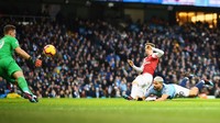 Manchester City sudah unggul duluan saat laga baru berjalan 46 detik. Sergio Aguero melesakkan gol lewat sundulan. (Foto: Carl Recine/Reuters)