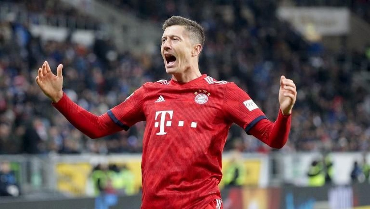 Robert Lewandowski membalas komentar pedas eks pemain Bayern, Dietmar Hamann. Foto: Hasan Bratic / dpa / AFP