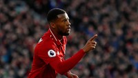 Gol kedua Gini Wijnaldum musim ini. Di laga ini, Wijnaldum sebenarnya tidak dalam kondisi fit karena didera gangguan pencernaan. (Jason Cairnduff/Reuters)