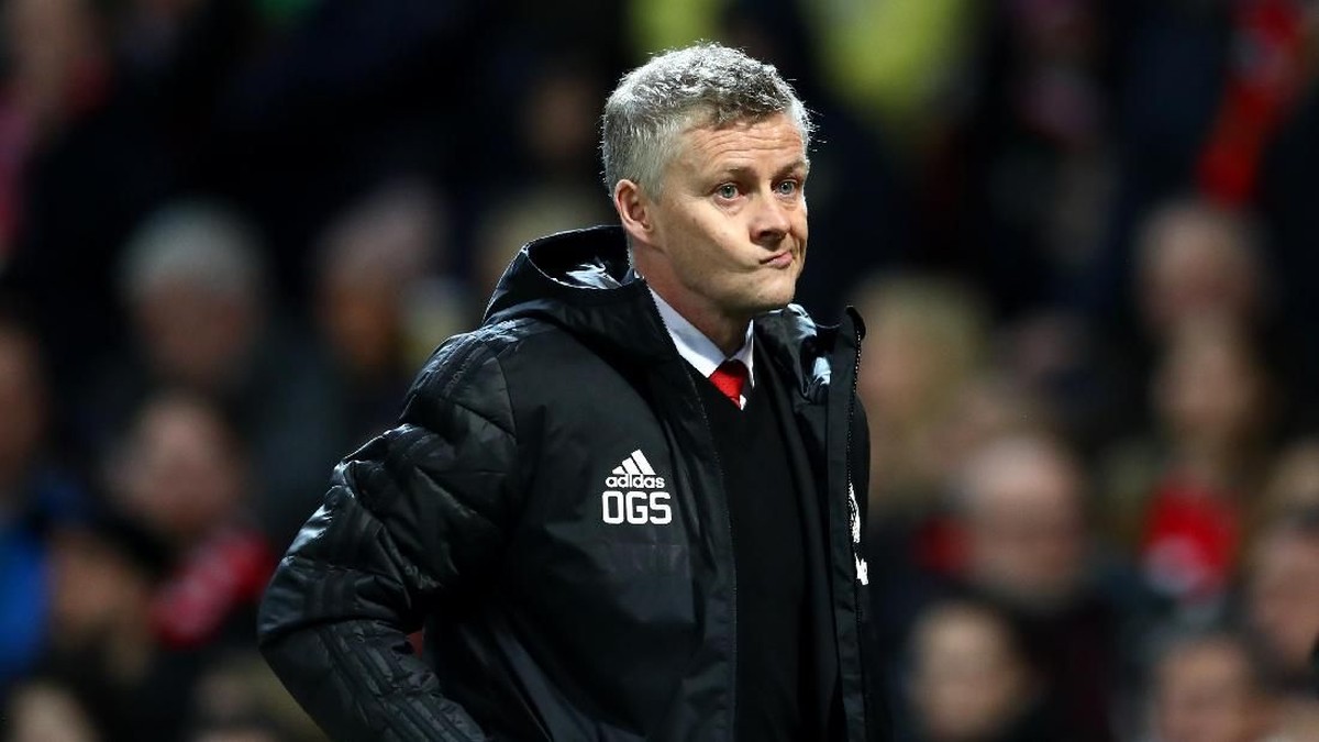 Ole Gunnar Solskjaer tak bisa menempati rumahnya sendiri di Manchester. (Michael Steele/Getty Images)