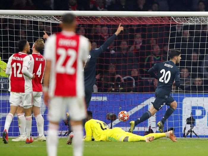 Marco Asensio merayakan gol kemenangan Real Madrid atas Ajax Amsterdam. (Foto: Wolfgang Rattay/Reuters) Marco Asensio merayakan gol kemenangan Real Madrid atas Ajax Amsterdam. (Foto: Wolfgang Rattay/Reuters)