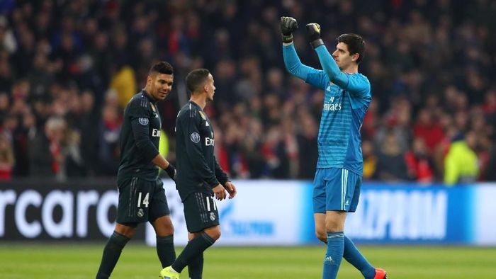 Pemain Real Madrid merayakan kemenangan 2-1 atas Ajax Amsterdam. (Foto: Lars Baron/Getty Images) Pemain Real Madrid merayakan kemenangan 2-1 atas Ajax Amsterdam. (Foto: Lars Baron/Getty Images)